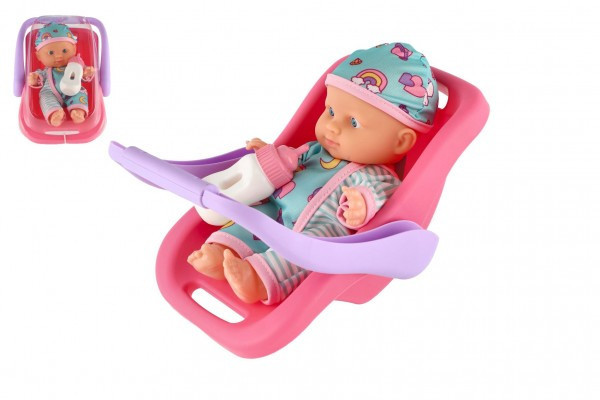 Bábika bábätko 20 cm plast v nosidle/autosedačke s fľaštičkou v blistri