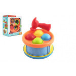 Zatĺkačka/bubínok 17cm 2v1 plast s kladivkom s loptičkami 4ks 2 farby v krabici 18x20x10cm 12m+